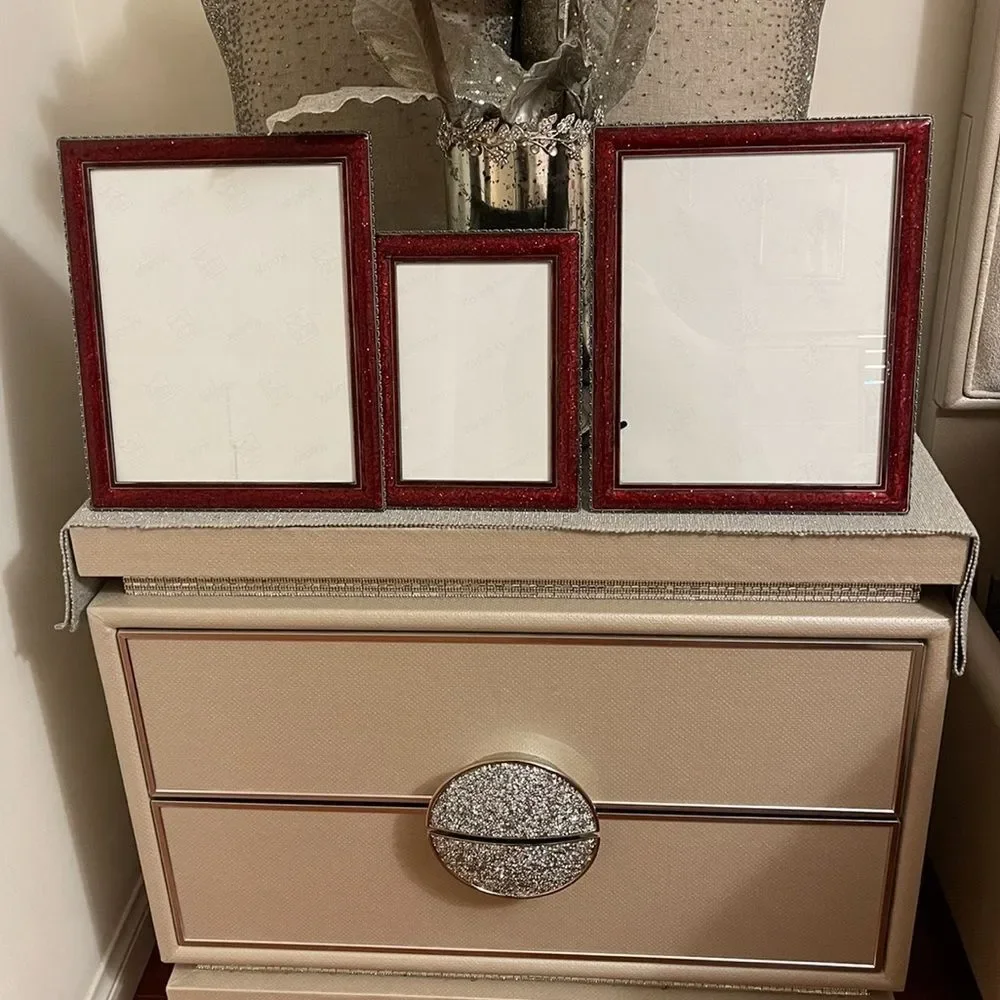 Three burgundy frames